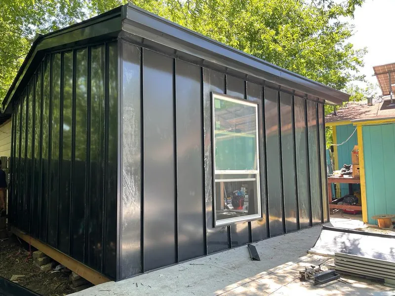 Black standing seam metal wall panels for Roof Inspection in Schuyler