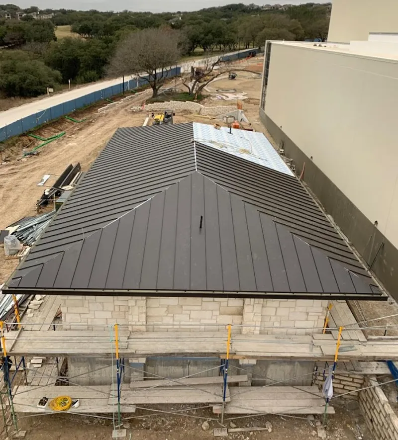 Metal roof new construction with scaffolding in Schuyler