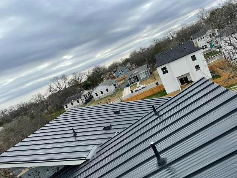Standing seam metal roof panels with vents for Skylight Repair in Schuyler